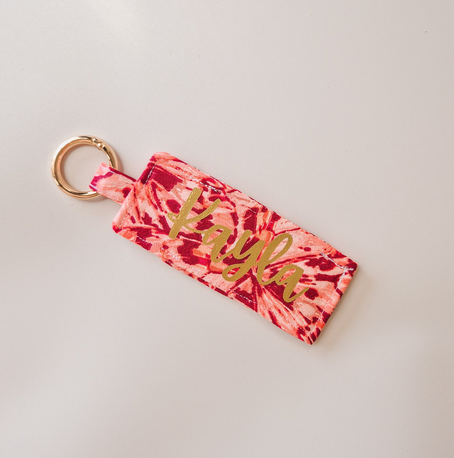 Personalised lip balm holder keyring